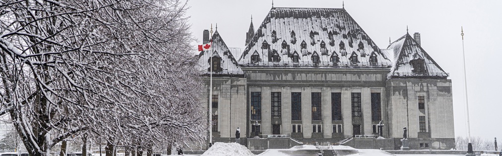 The exterior of the Supreme Court of Canada building in the winter