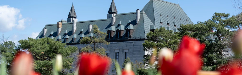 The exterior of the Supreme Court of Canada building in the spring