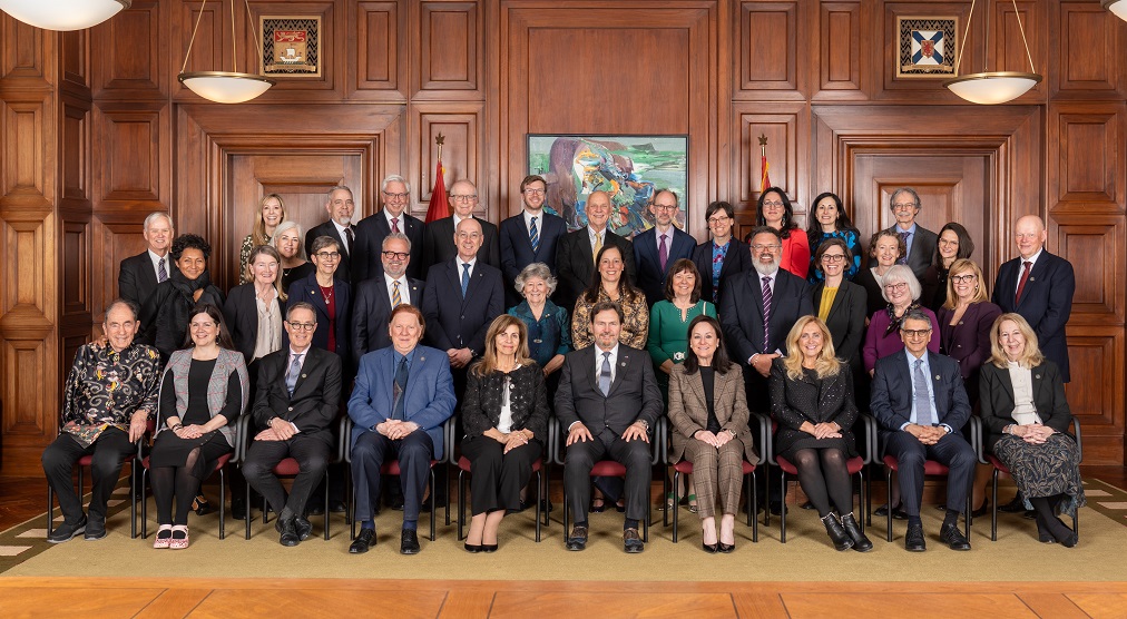 Group photo of the judges, panellists and moderators who participated in the symposium