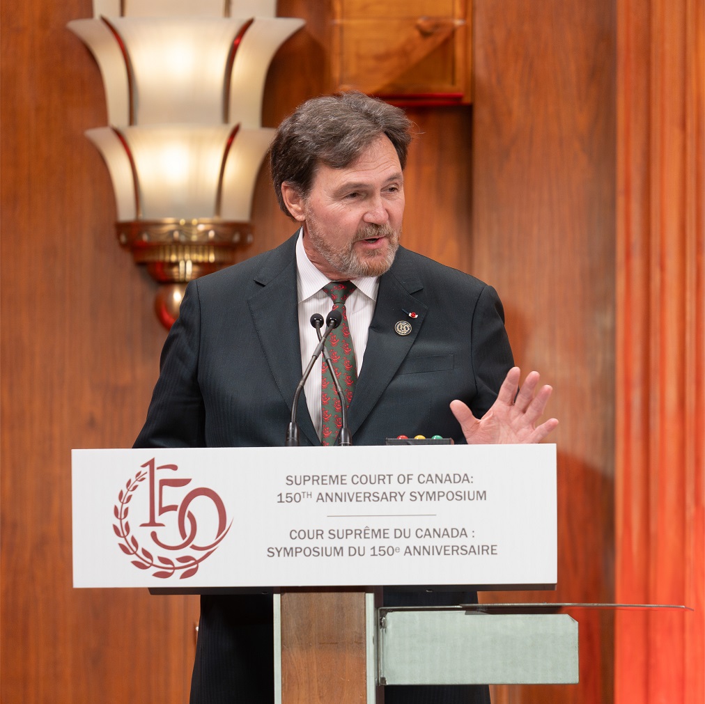 Chief Justice Wagner speaks at a podium