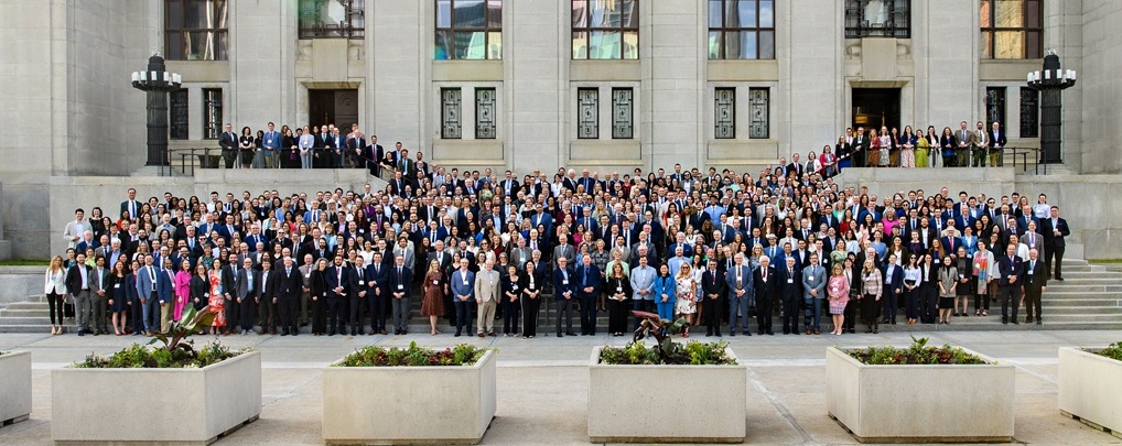 A group photo of the law clerk reunion participants on the front steps of the Supreme Court building