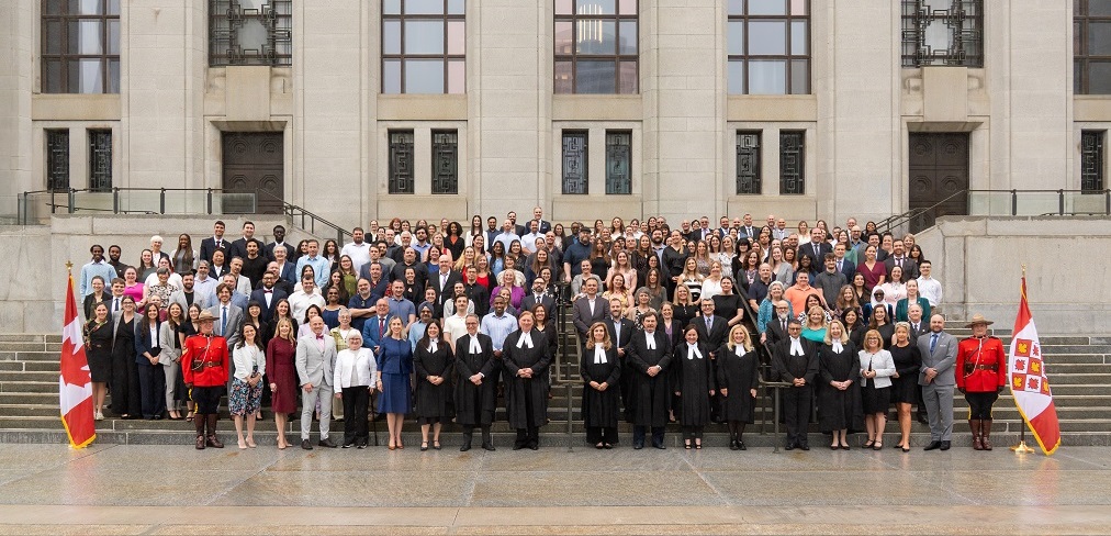 Group photo of the Supreme Court of Canada staff on the front steps of the building
