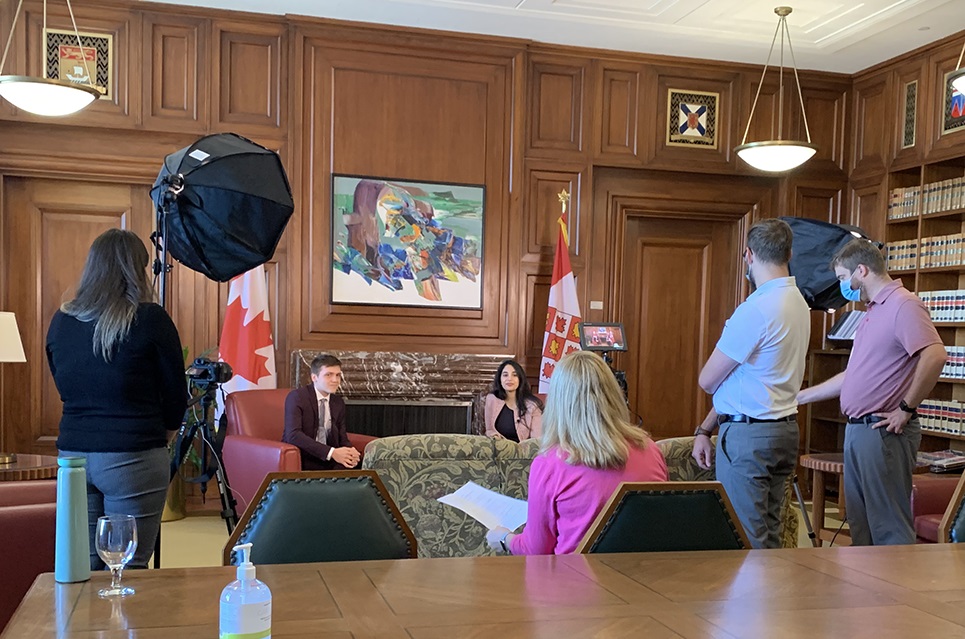 Employees filming a video