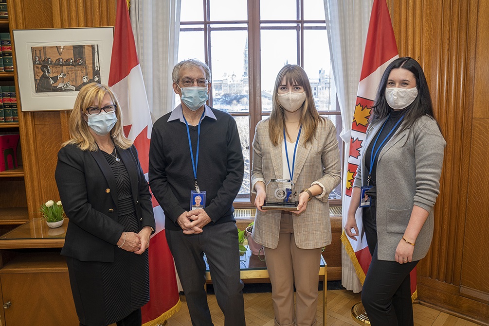 The Registrar and three employees