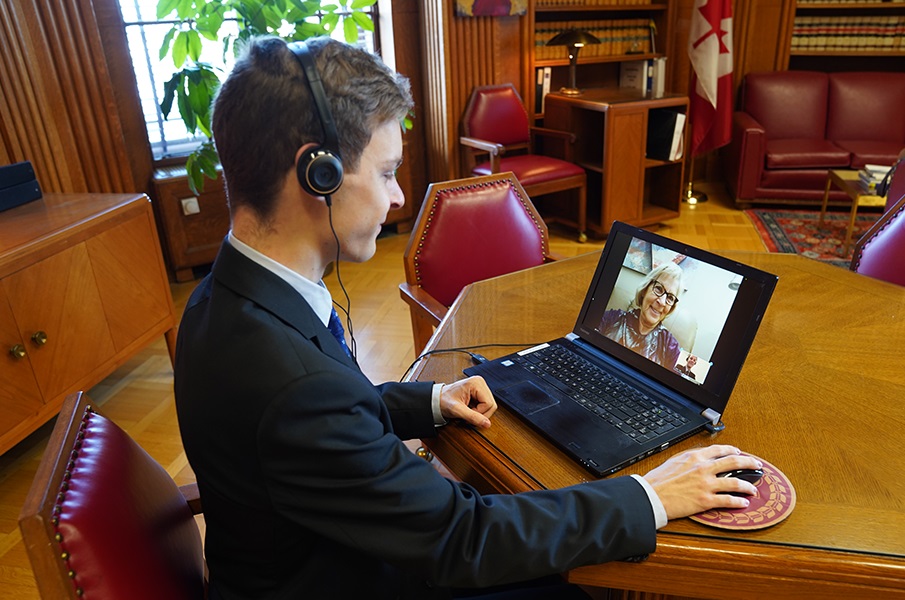 A tour interpreter at his computer